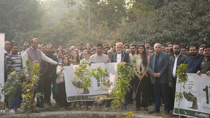 Laborate Pharmaceuticals Plants 500 Trees in Green Push